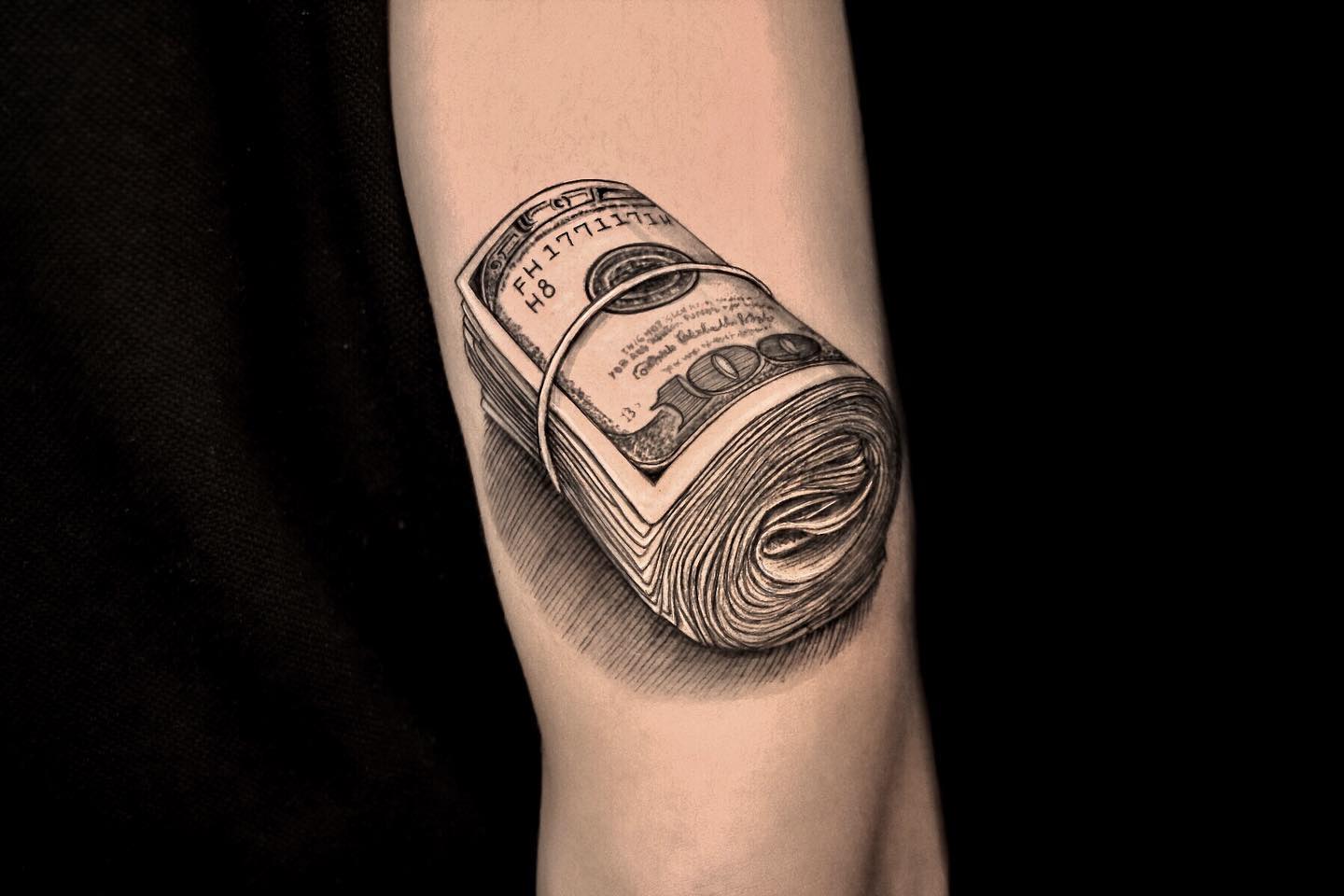 money outer forearm tattoos for men 0016