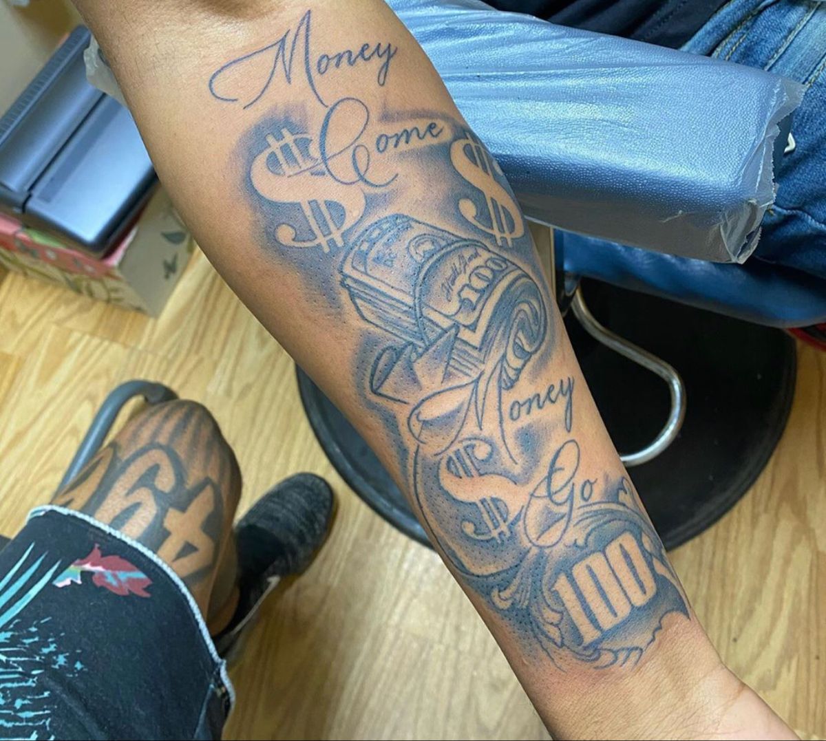 money outer forearm tattoos for men 0023