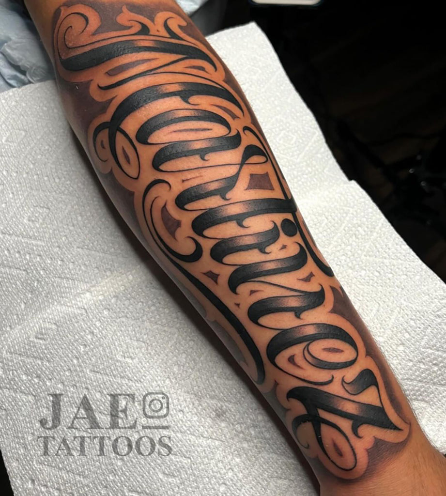 name tattoos for men on arm