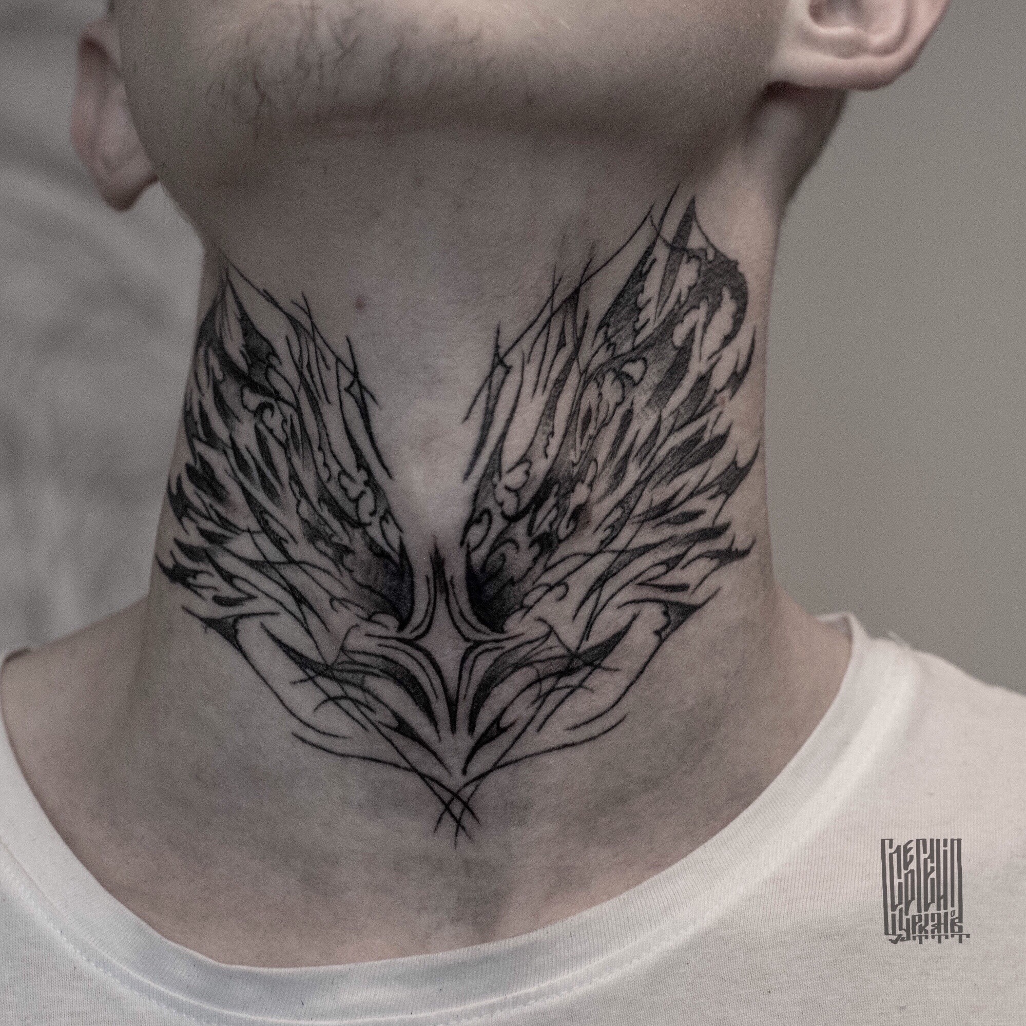 neck tattoos for men wings 0023