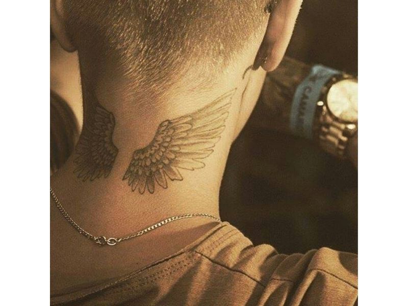 neck tattoos for men wings 0027