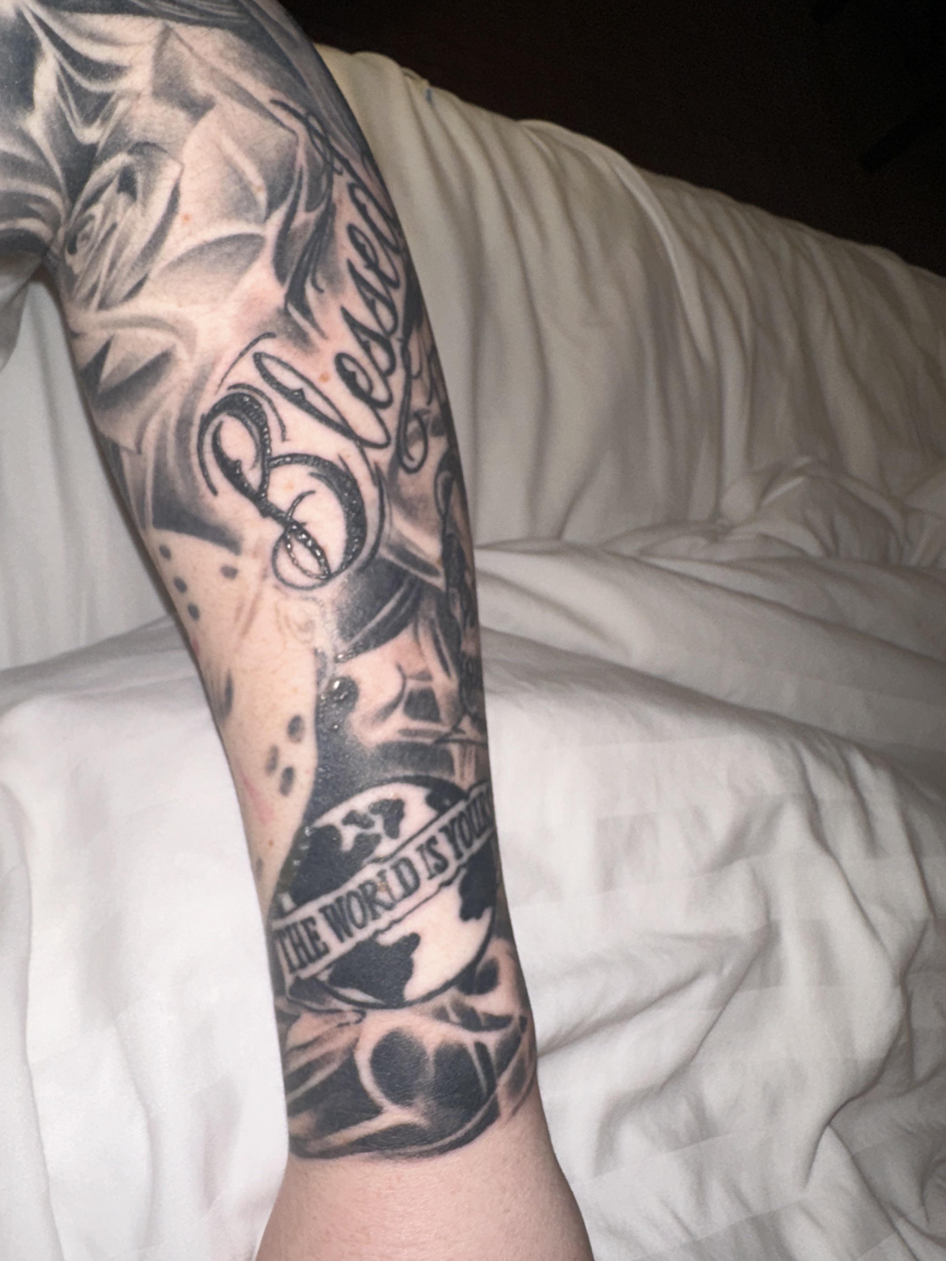 outer forearm tattoos for men 0019