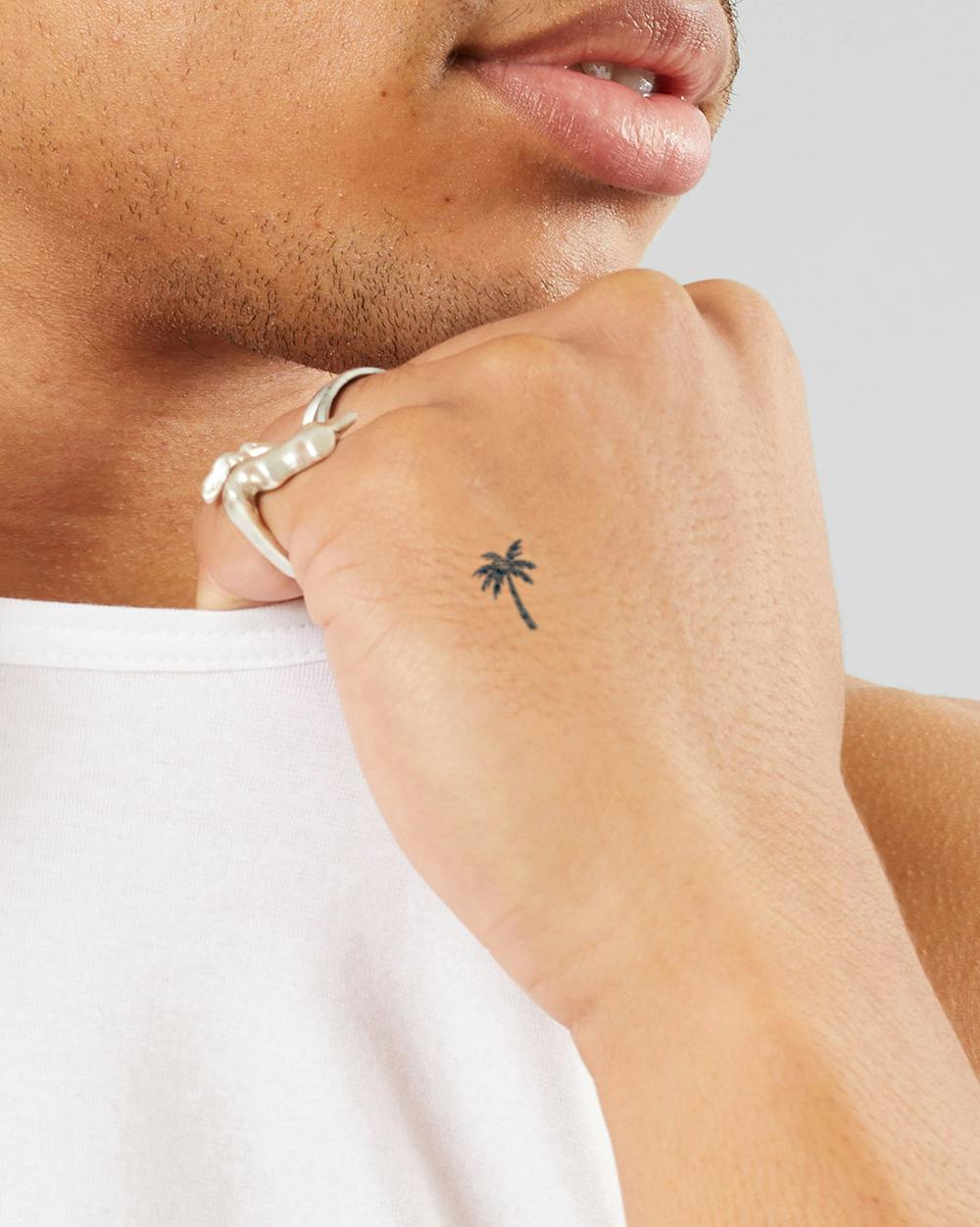 palm size tattoos for men 0026