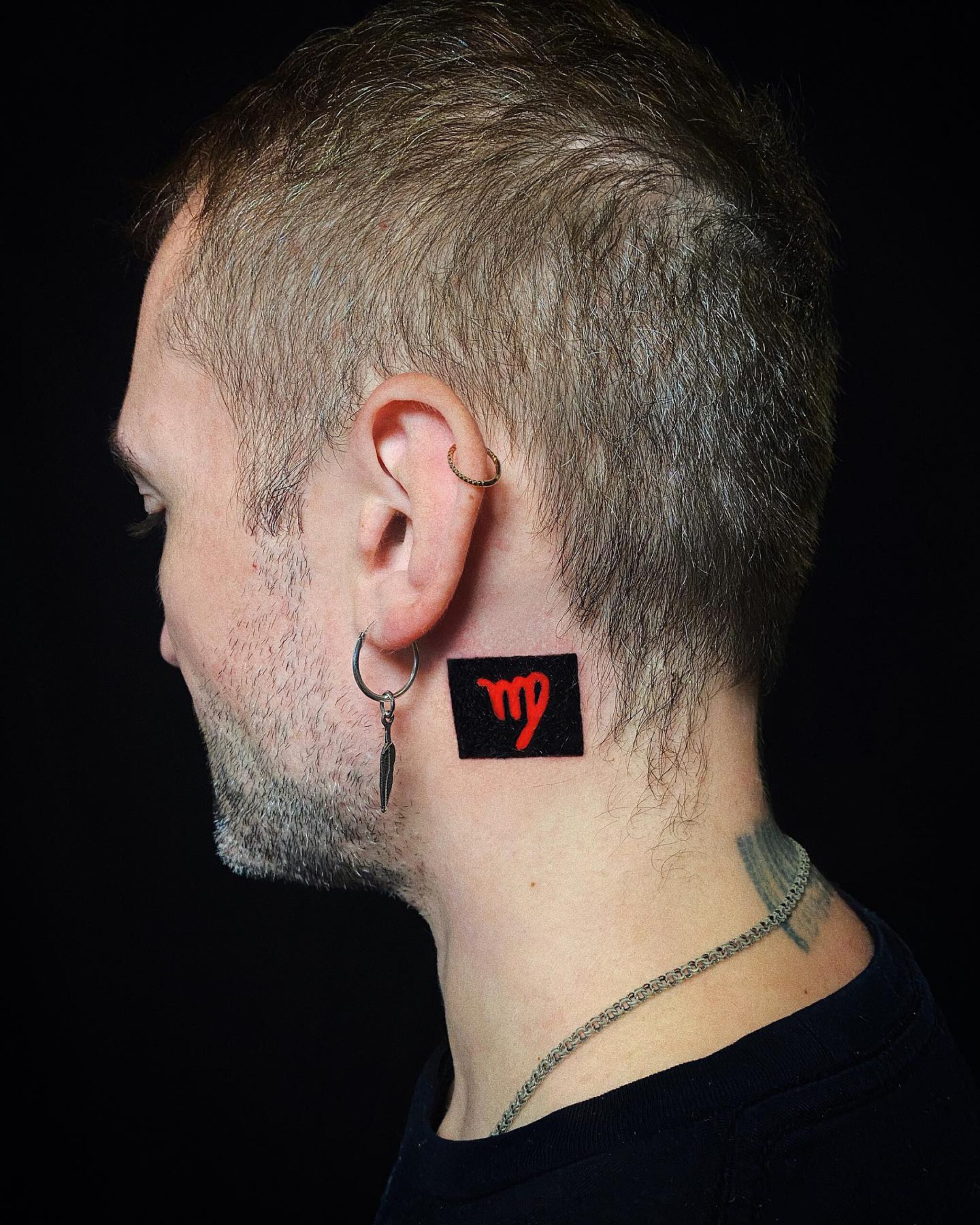 popular behind the ear tattoos for men