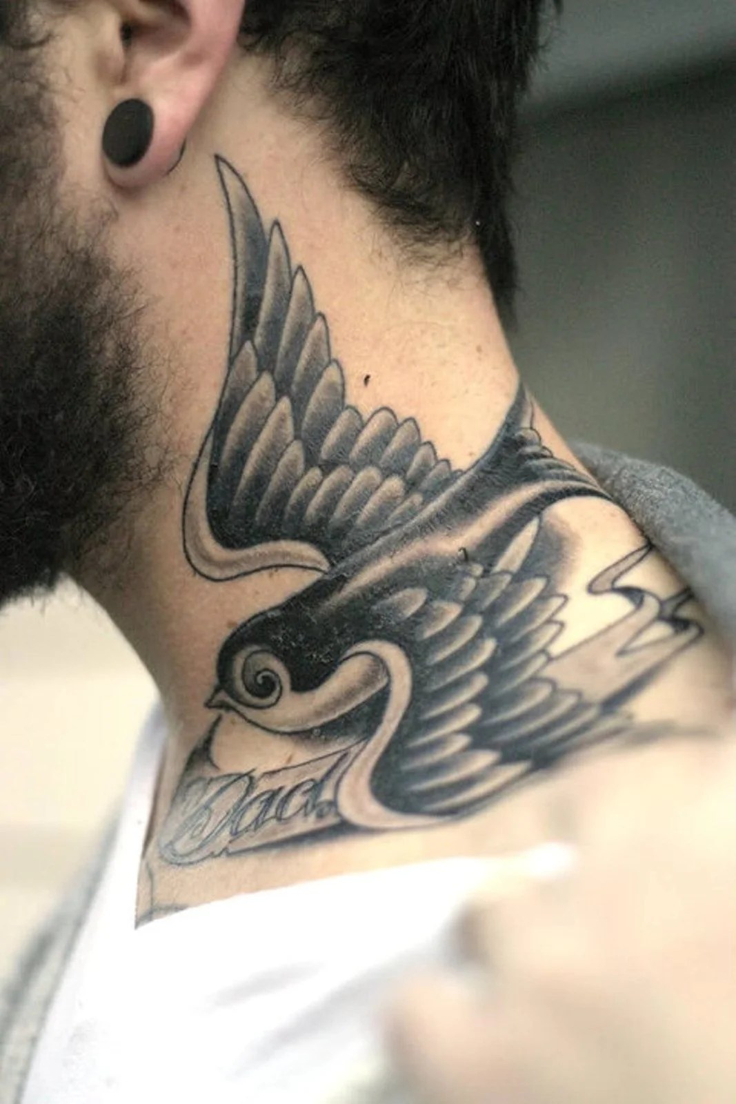 popular bird neck tattoos for men