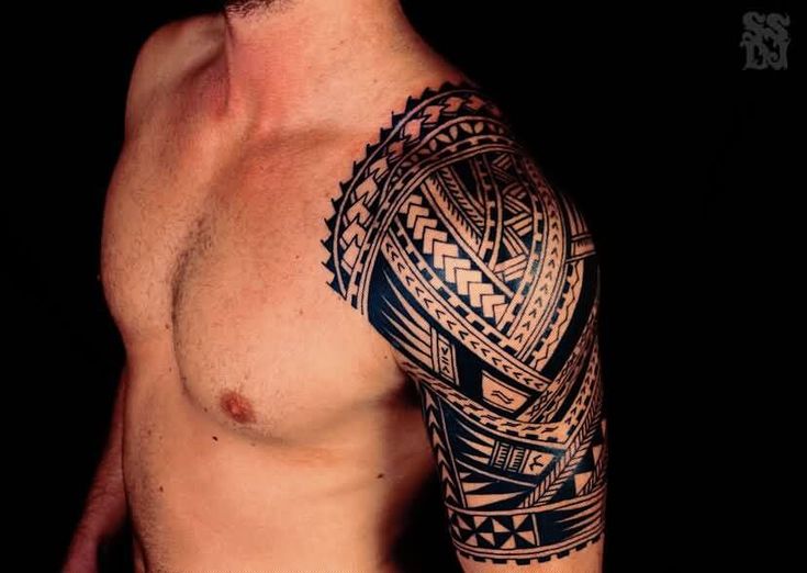 popular designs of tribal arm tattoos for men