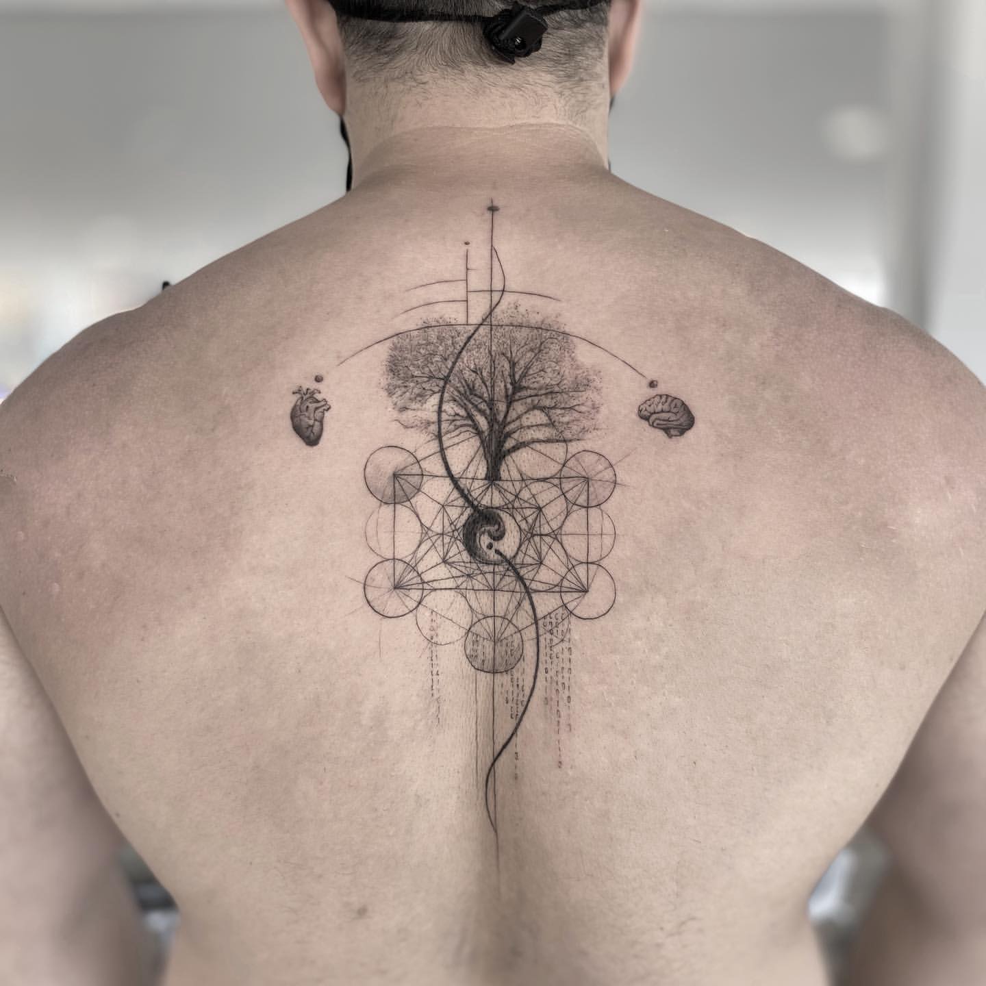 popular small tattoos for men on back