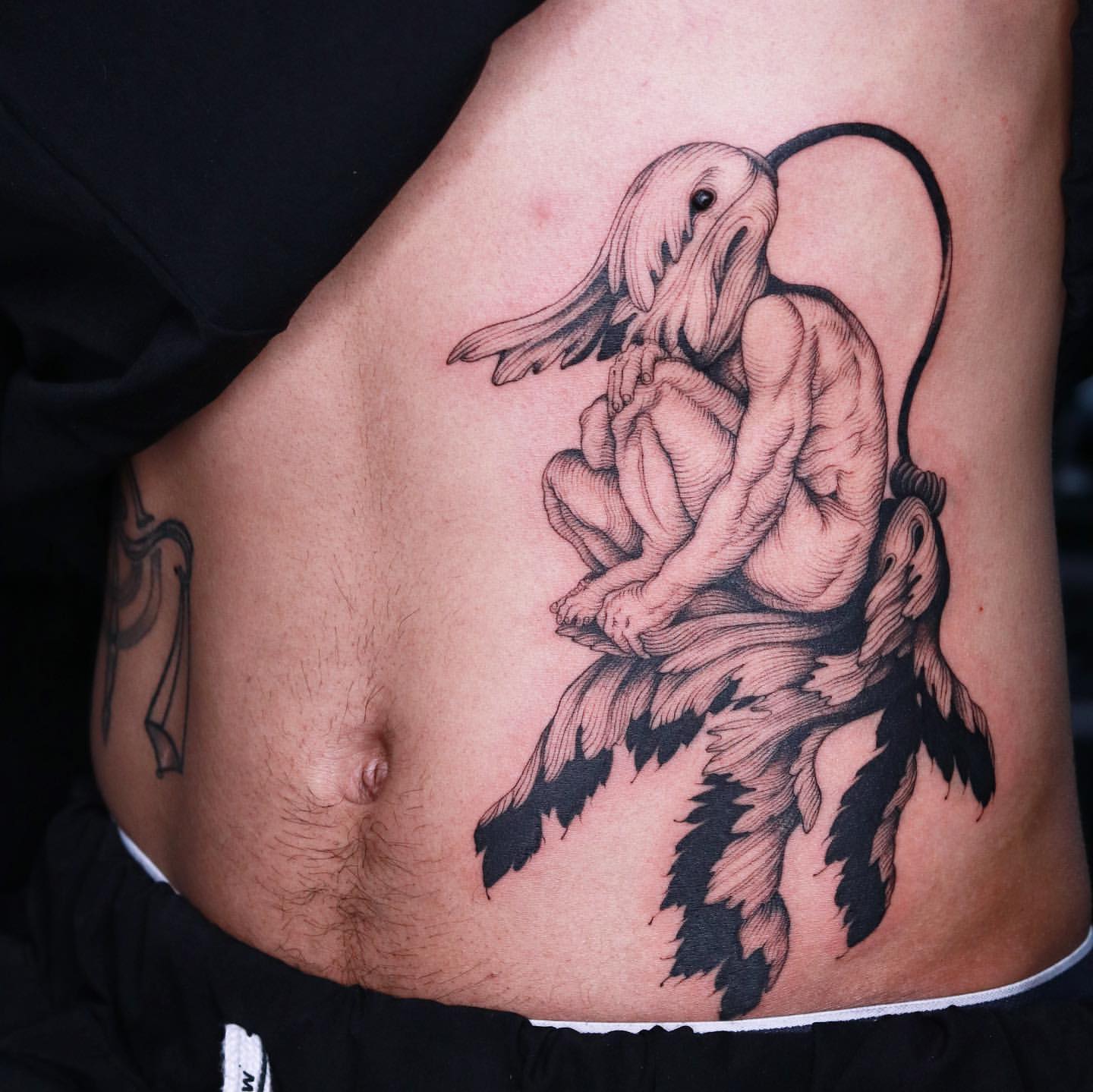 popular stomach tattoos for men styles