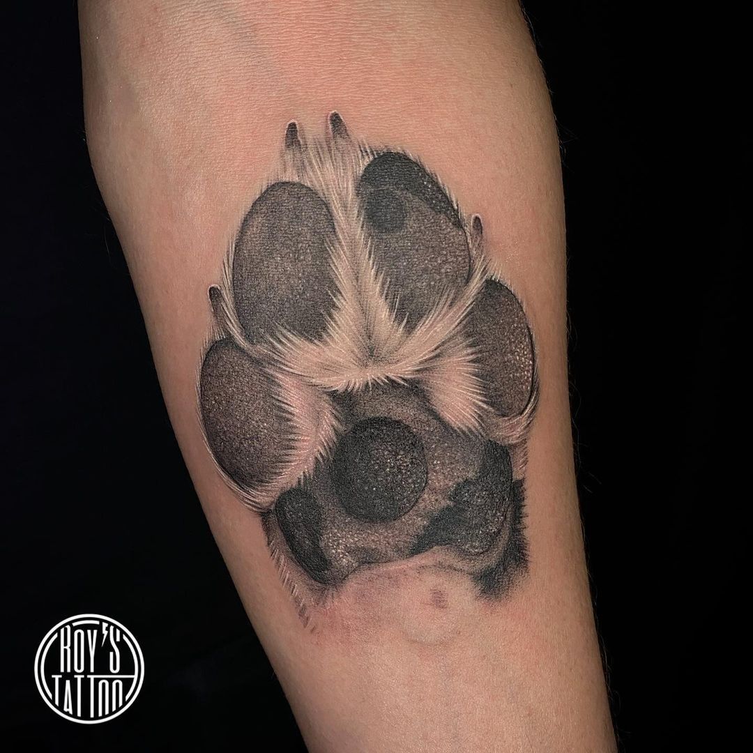 popular styles of paw print tattoos for men