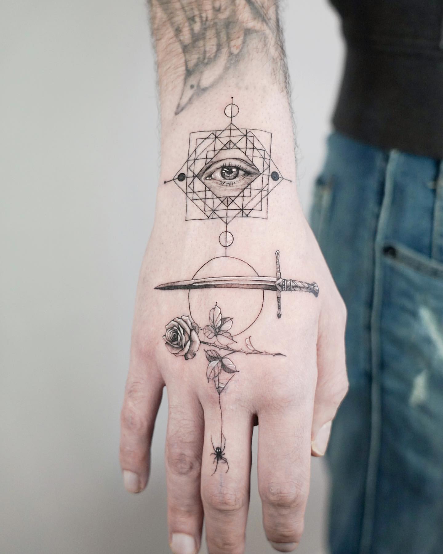 popular symbol hand tattoos for men