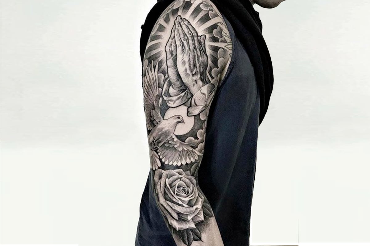 popular themes in religious sleeve tattoos for men