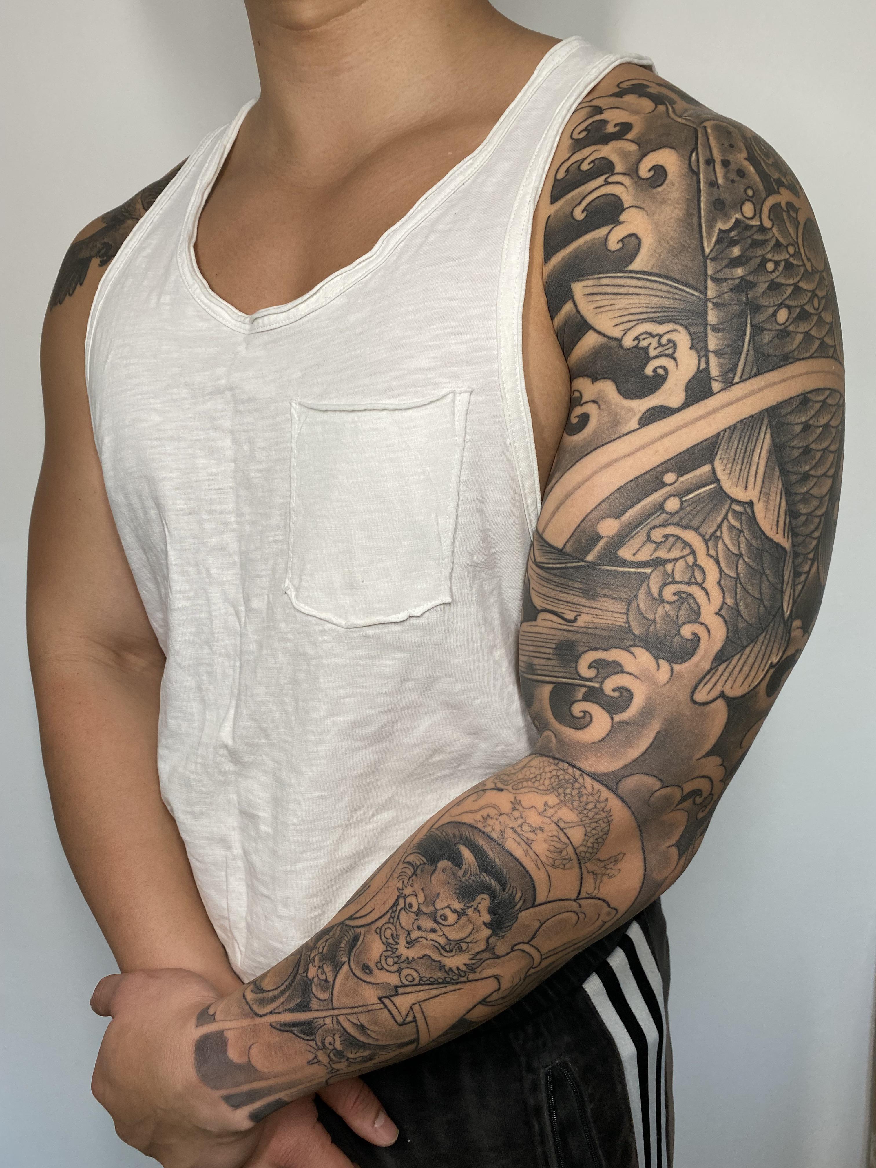 quarter sleeve tattoos for men 0012