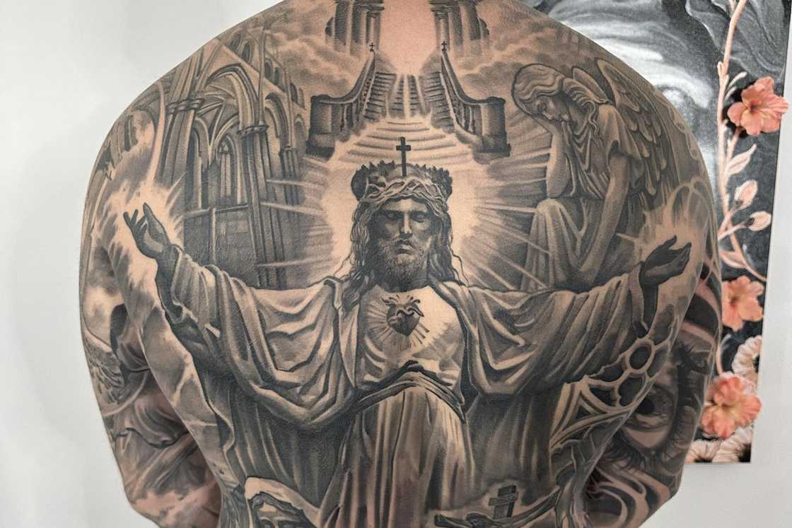 religious back tattoos for men 0025