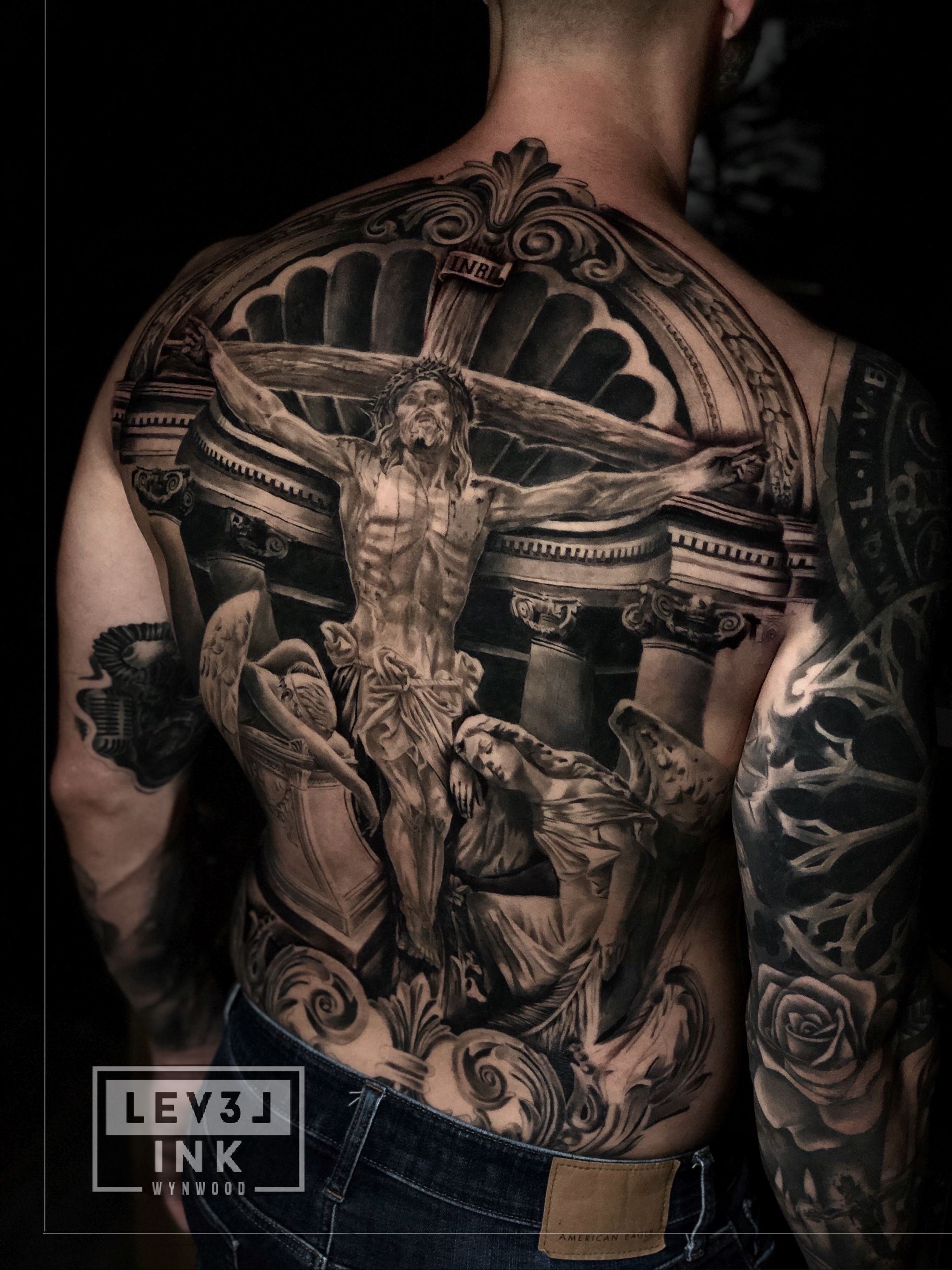 religious back tattoos for men 0061