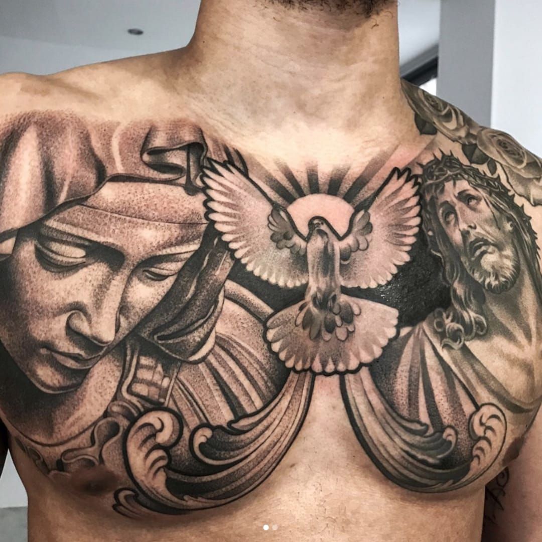 religious chest tattoos for men symbolism