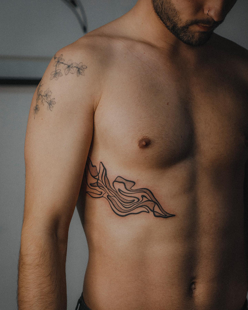 rib tattoos for men 0022