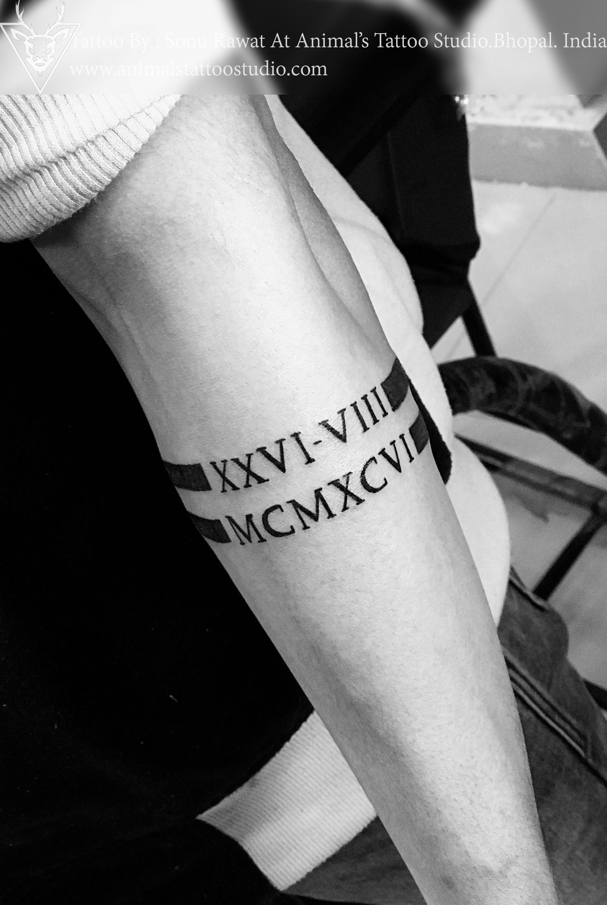 Roman numeral tattoos for men 0019