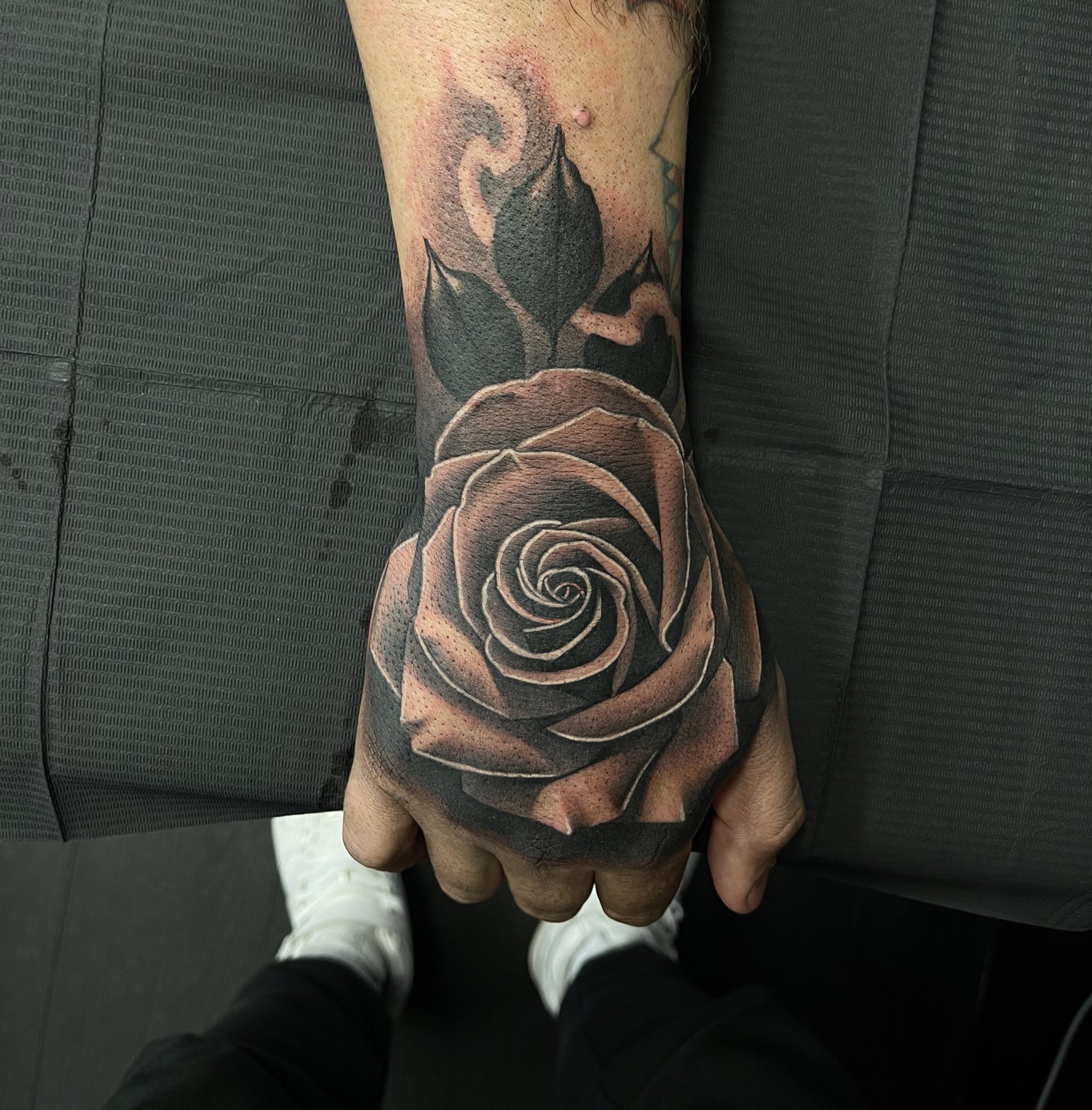 rose tattoos for men on hand 0013