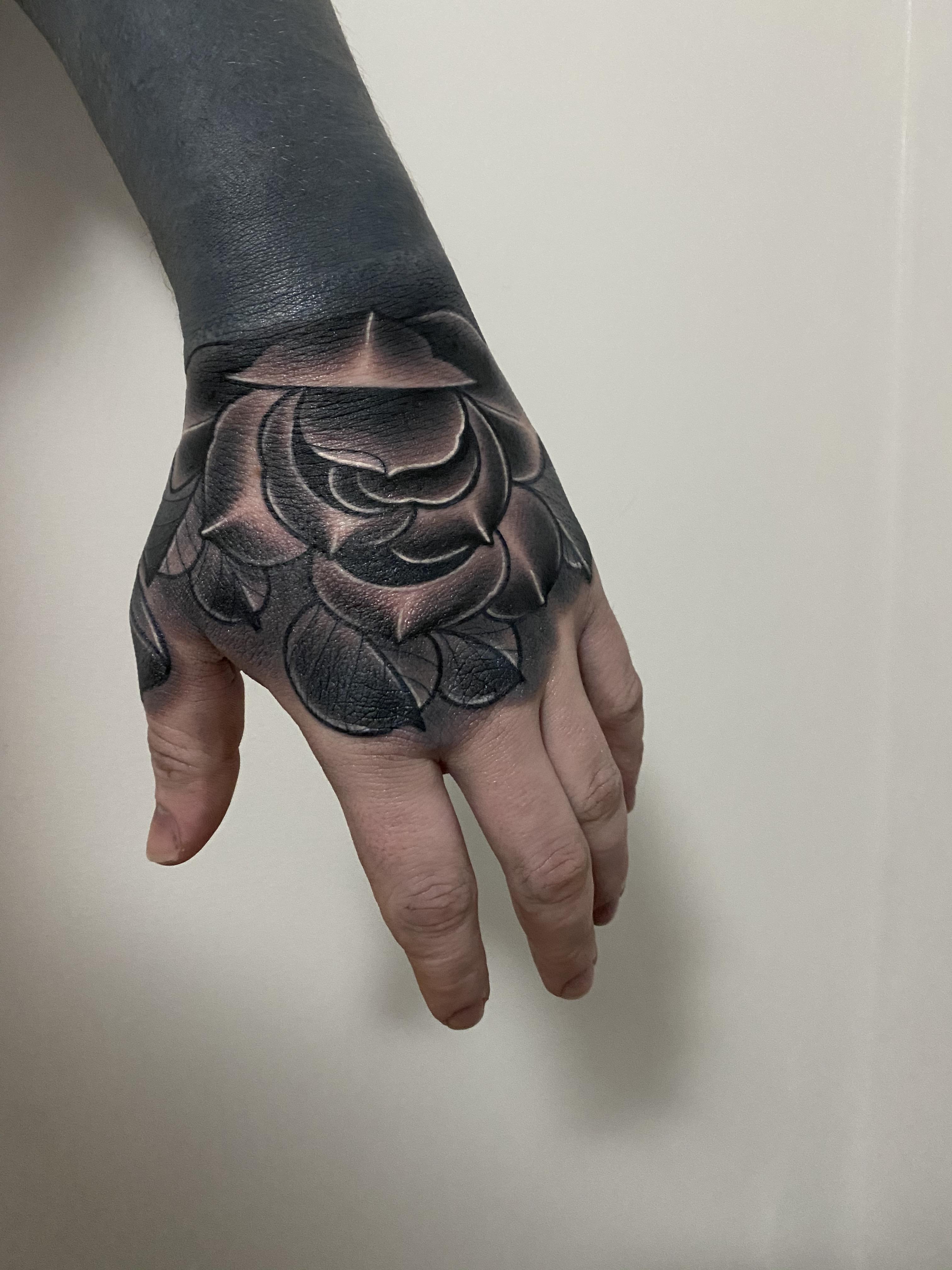 rose tattoos for men on hand 0030