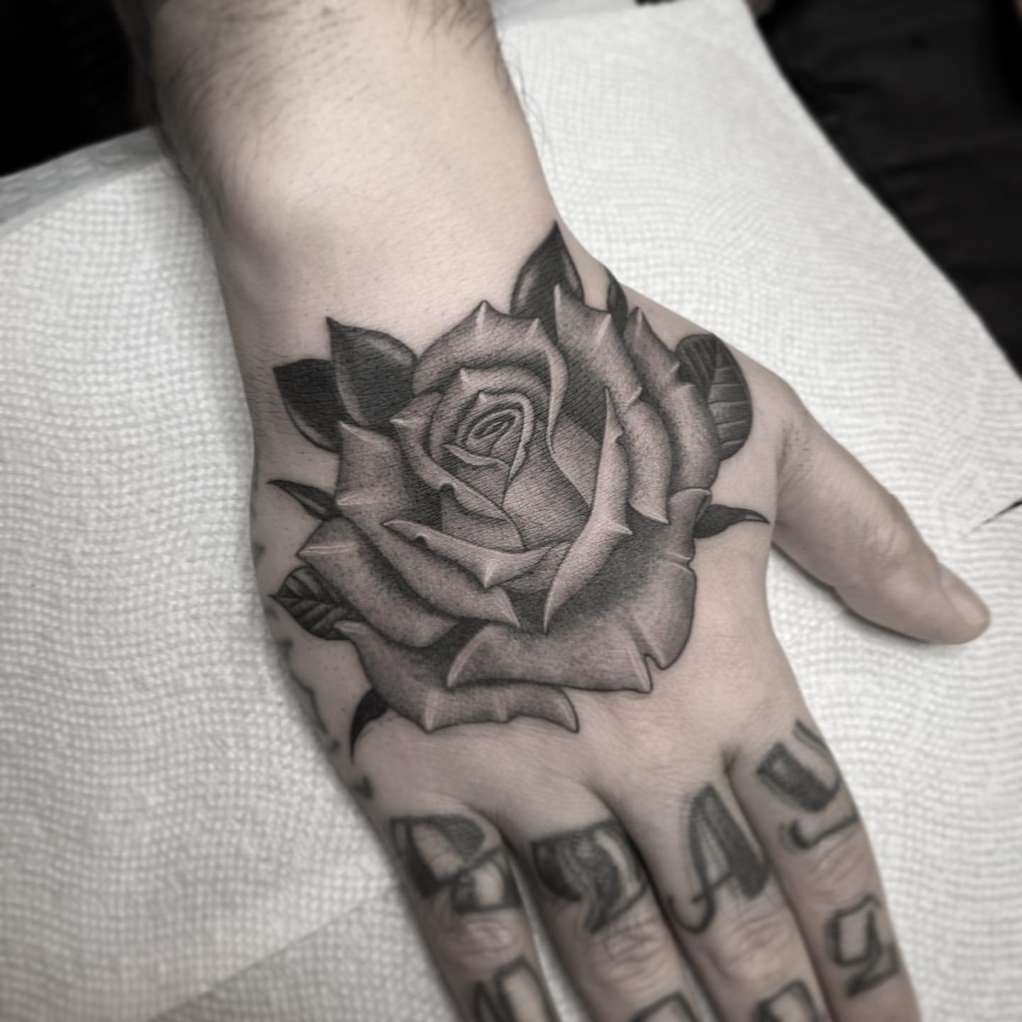 rose tattoos for men on hand 0065