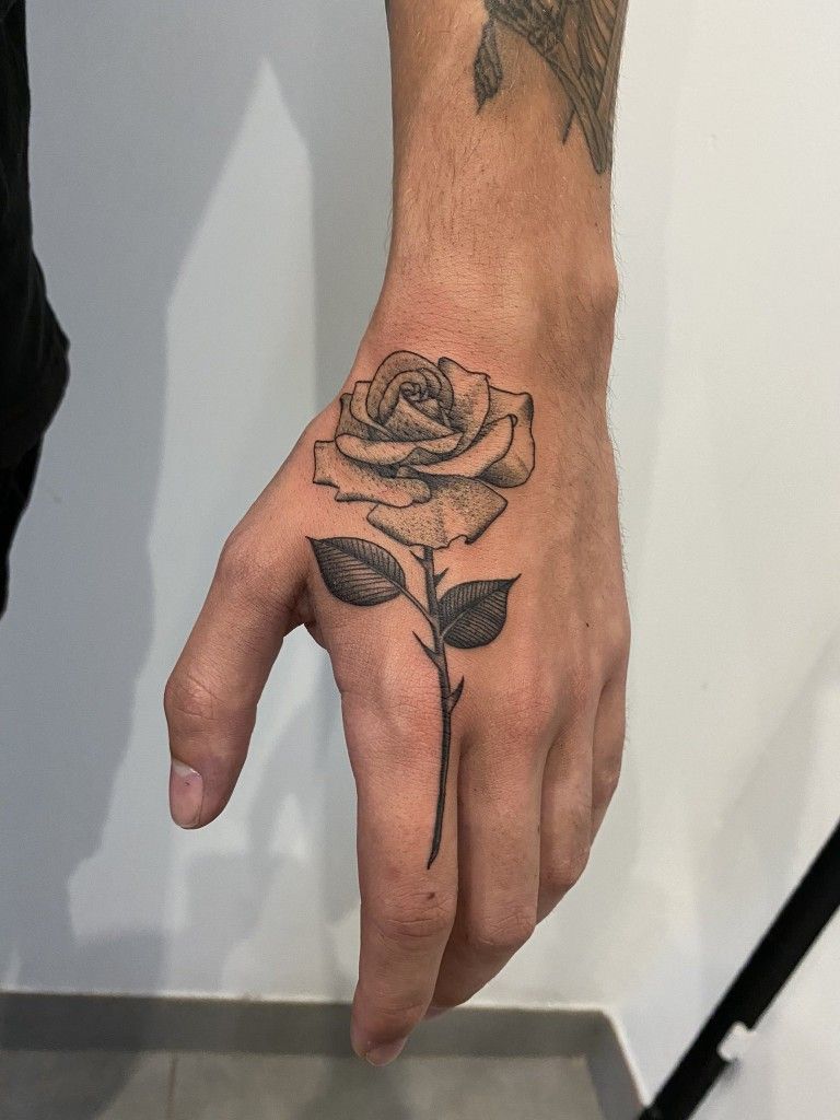 rose tattoos for men on hand 0082