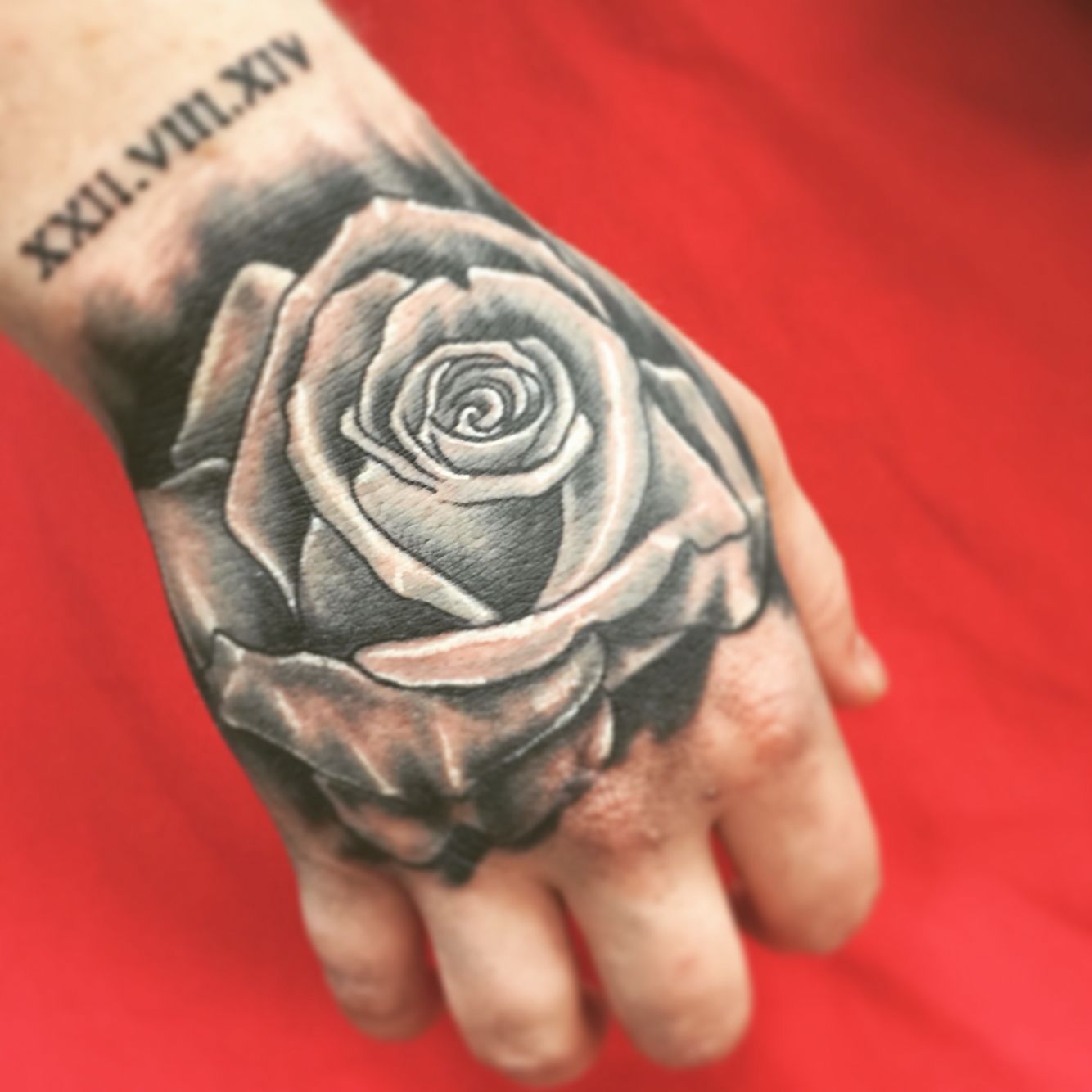 rose tattoos for men on hand 0097