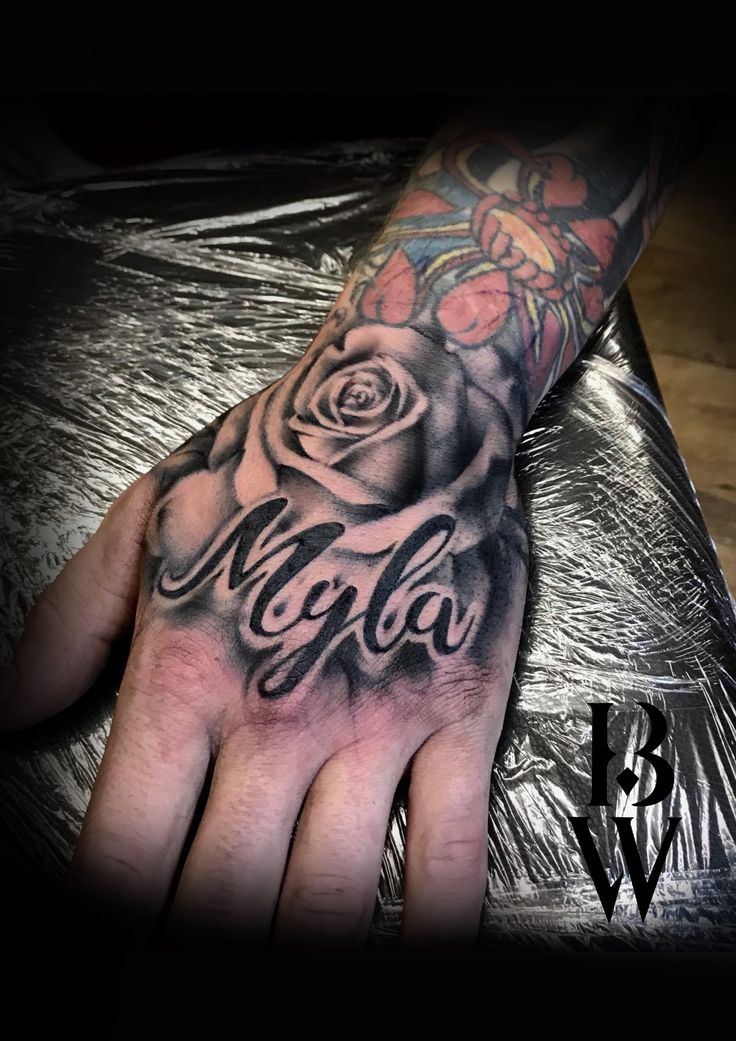 rose tattoos for men on hand 0099