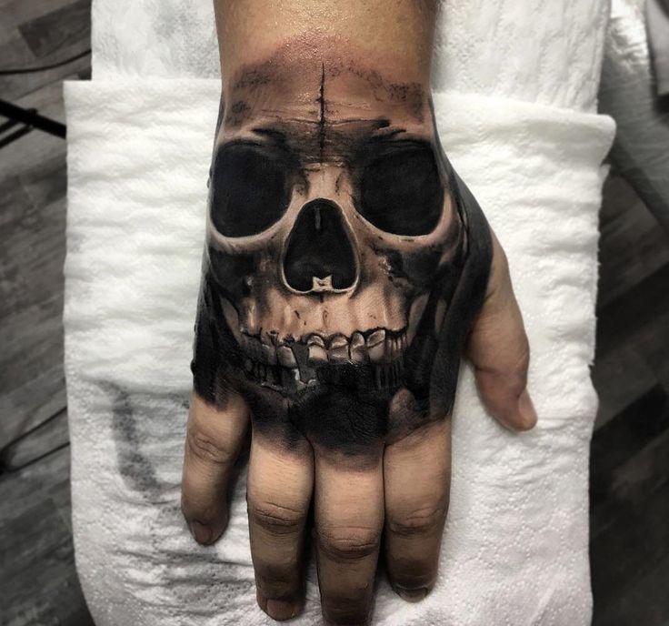 skull hand tattoos for men ideas