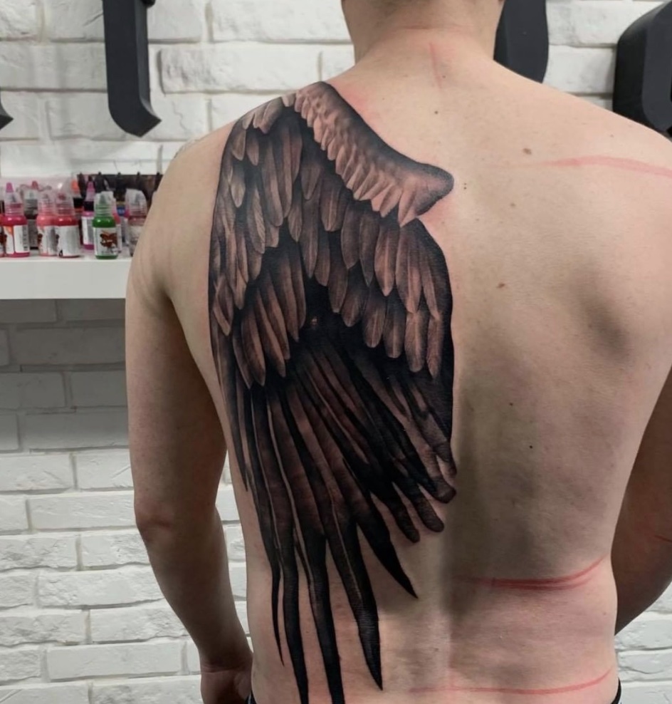 sleeve wing tattoos for men