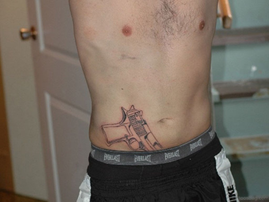 small gun tattoos for men