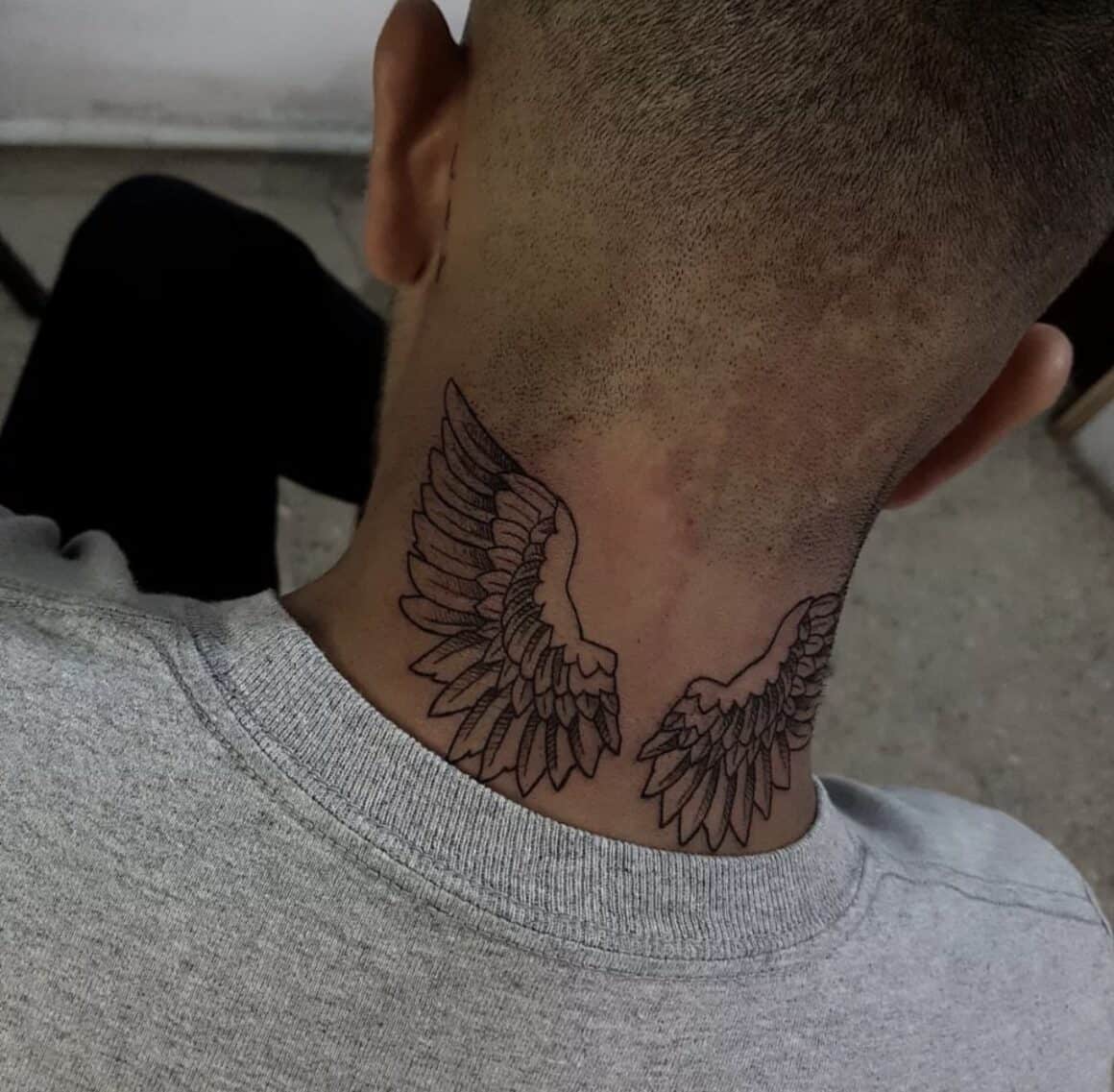 small neck tattoos for men wings trends