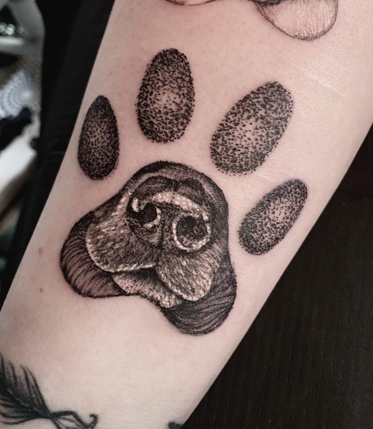 small paw print tattoos for men