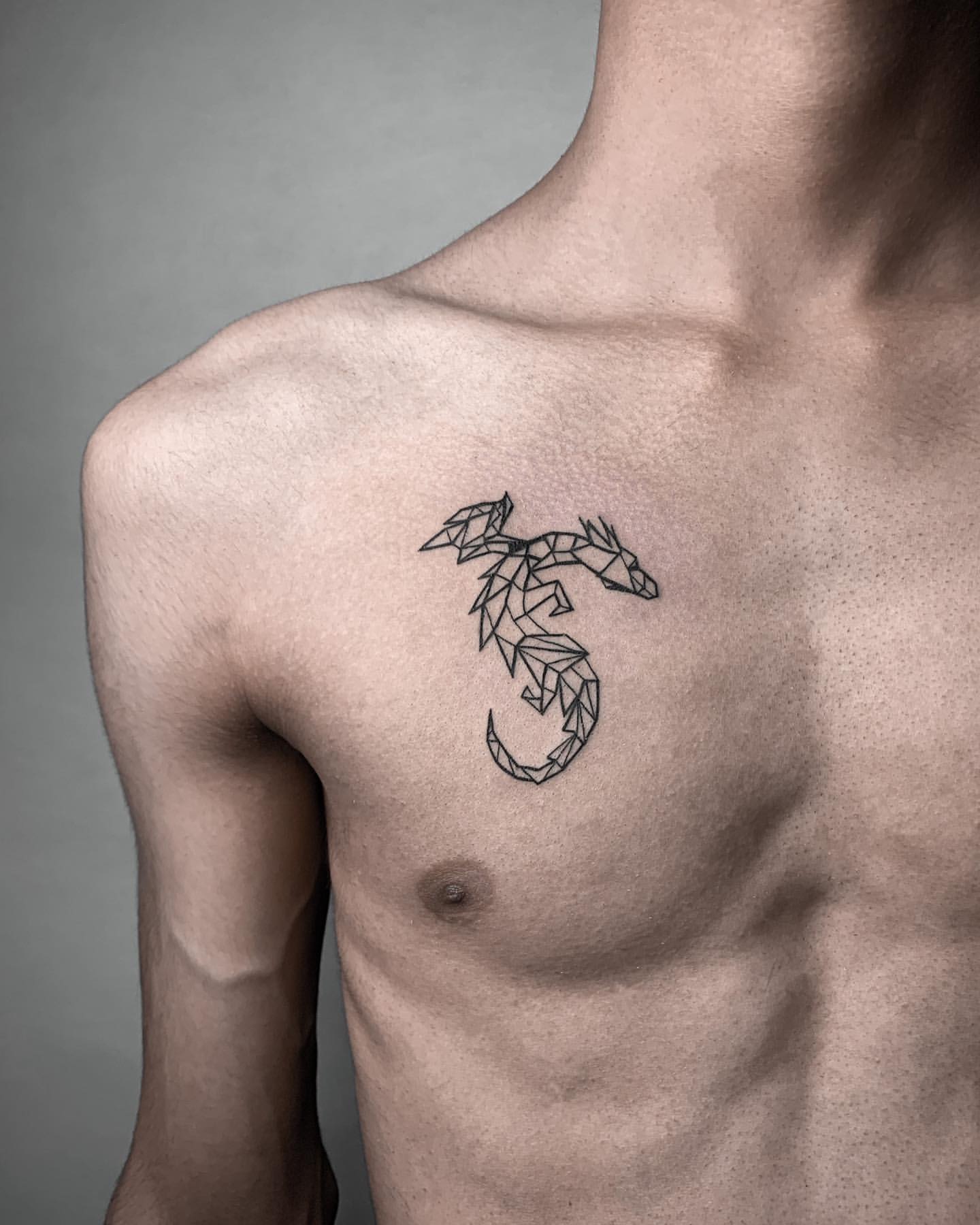 small tattoos for men on back 0042