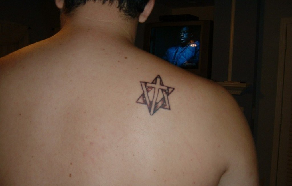 small tattoos for men on back 0048