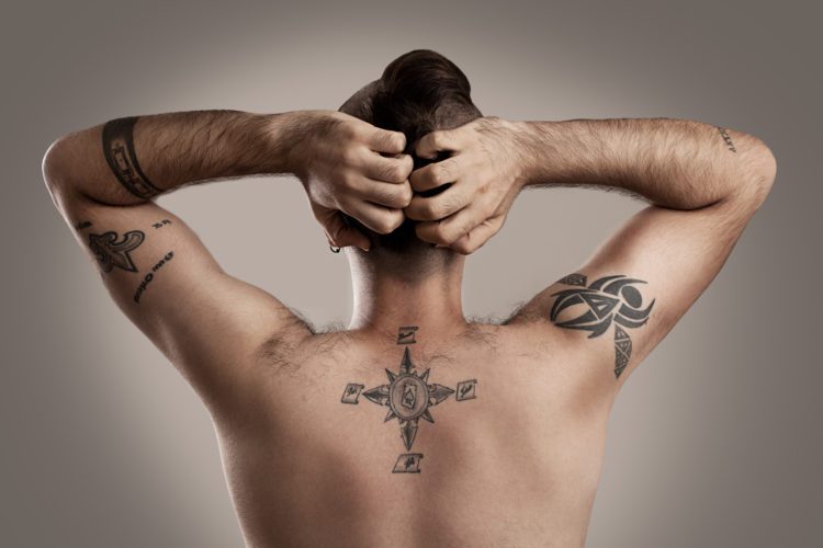 small tattoos for men on back 0070