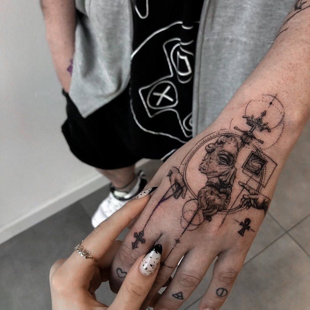 small tattoos for men on hand 0036