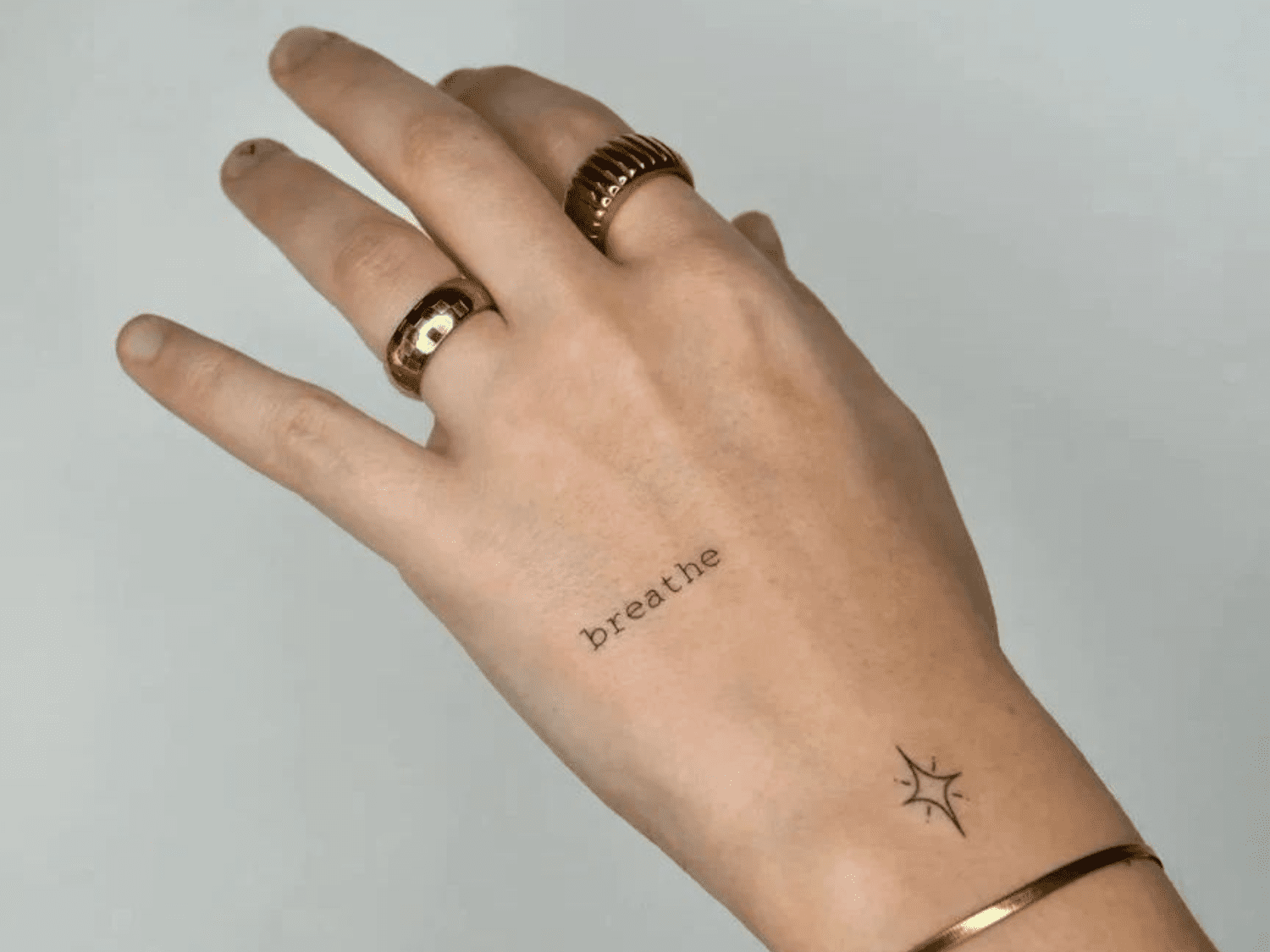 small tattoos for men on hand 0039