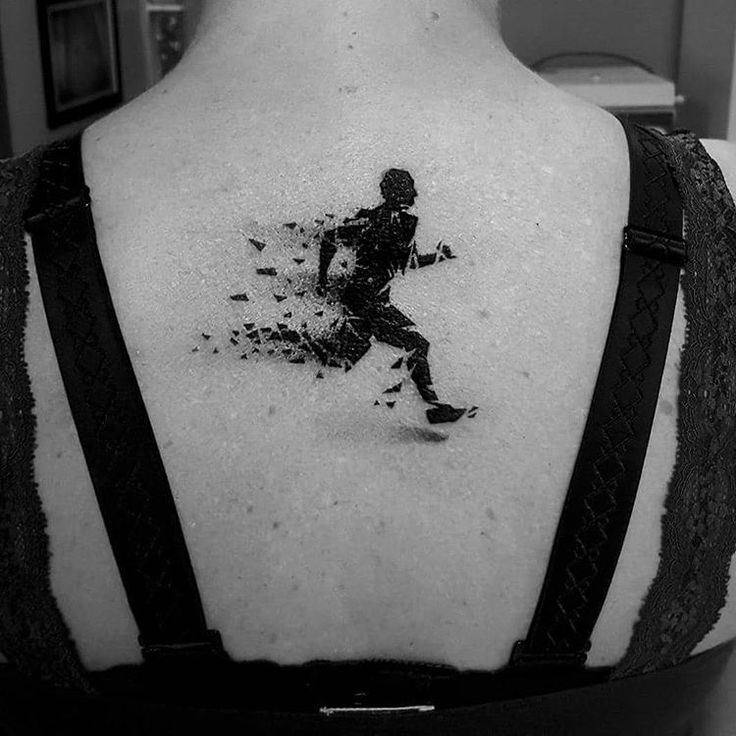 sports-themed running tattoos for men