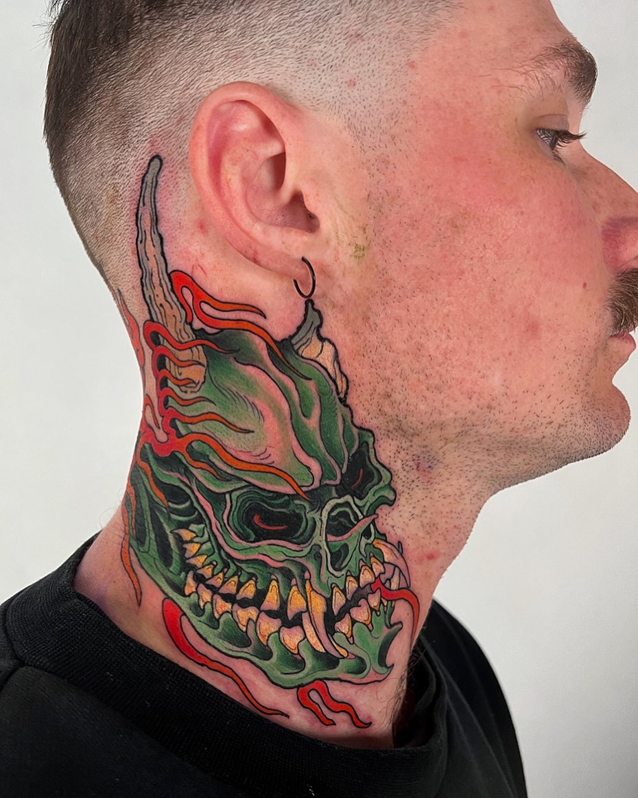 striking neck tattoos featuring skull designs for men