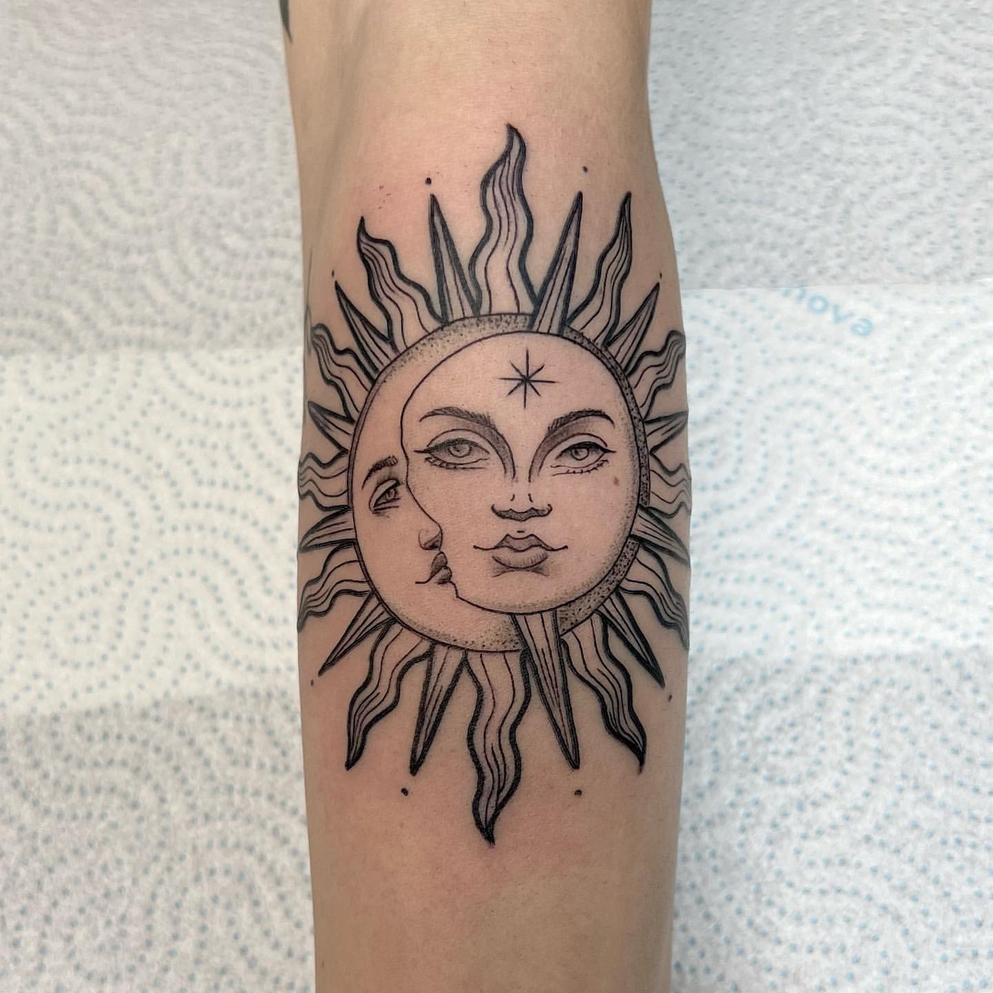 sun and moon tattoos for men 0025