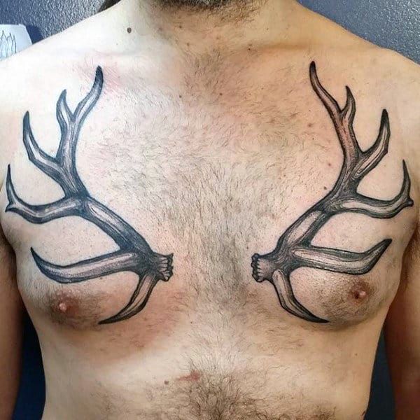 symbolic antler tattoos for men