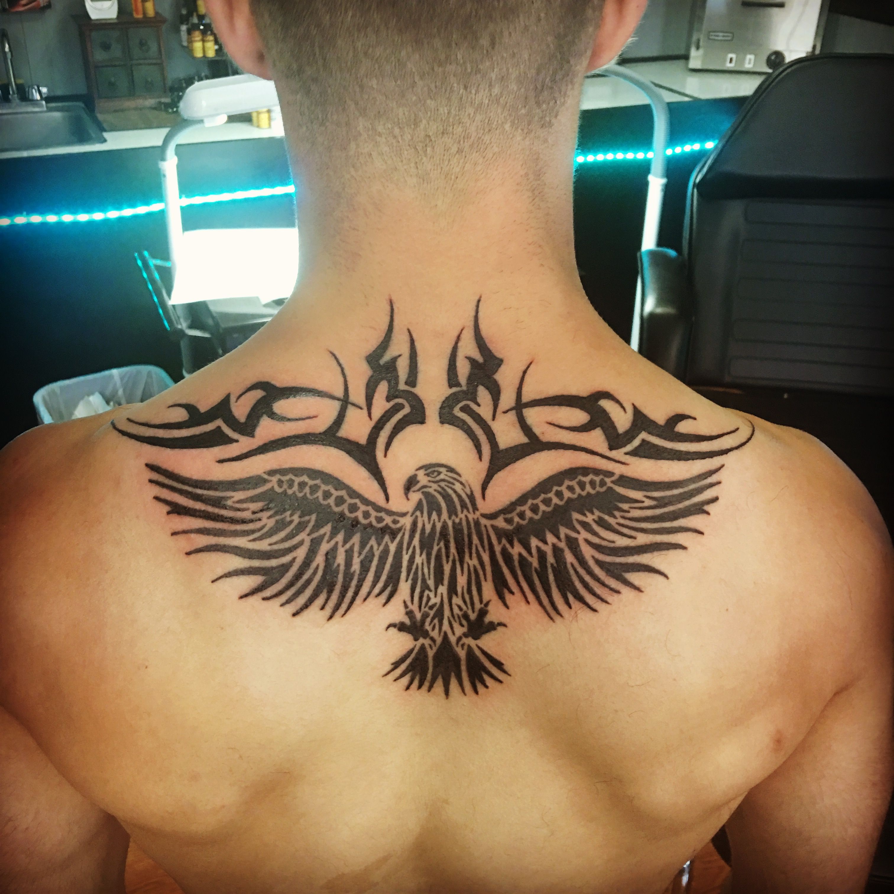 symbolism of back eagle tattoos for men