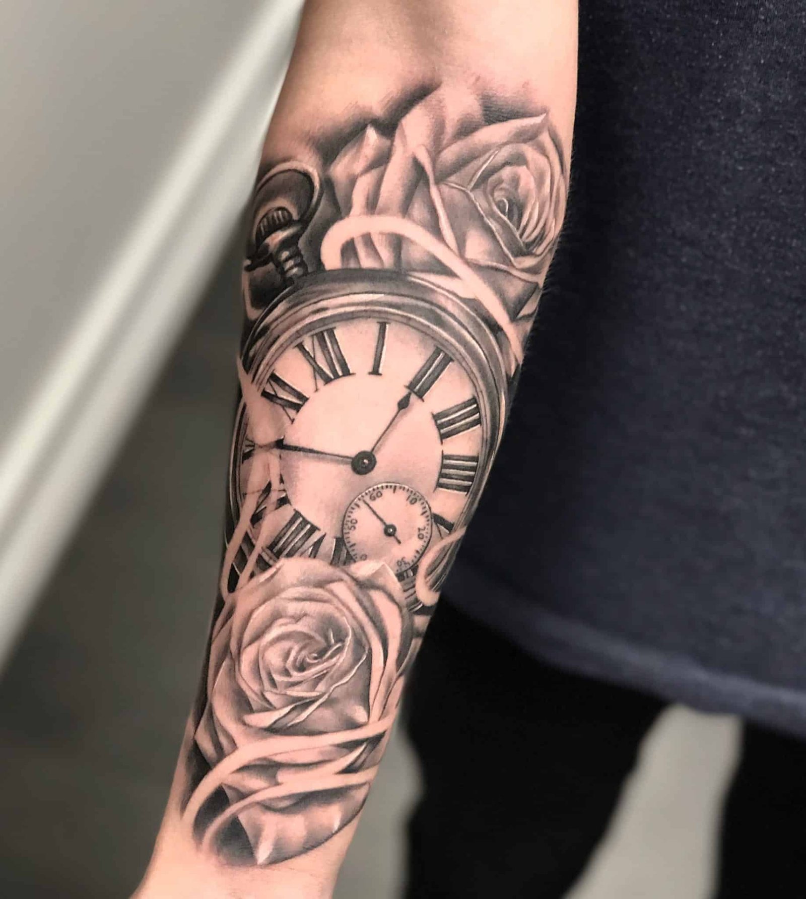 symbolism of clock inner forearm tattoos for men