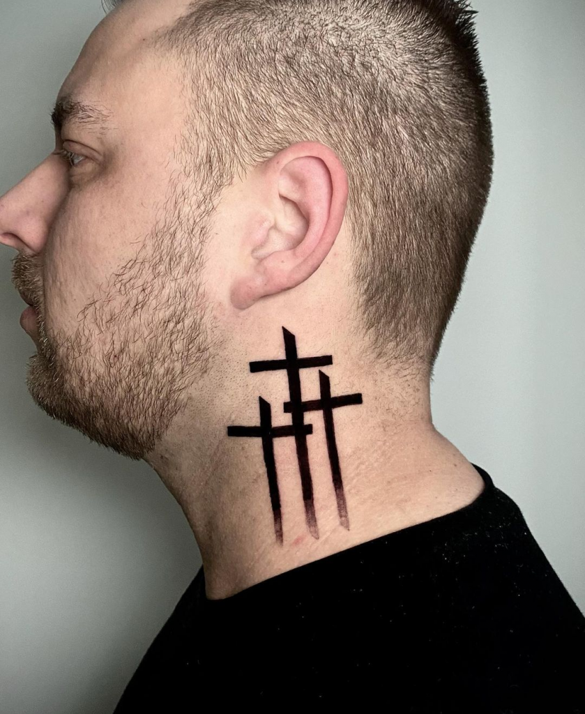 symbolism of Cross neck tattoos for men