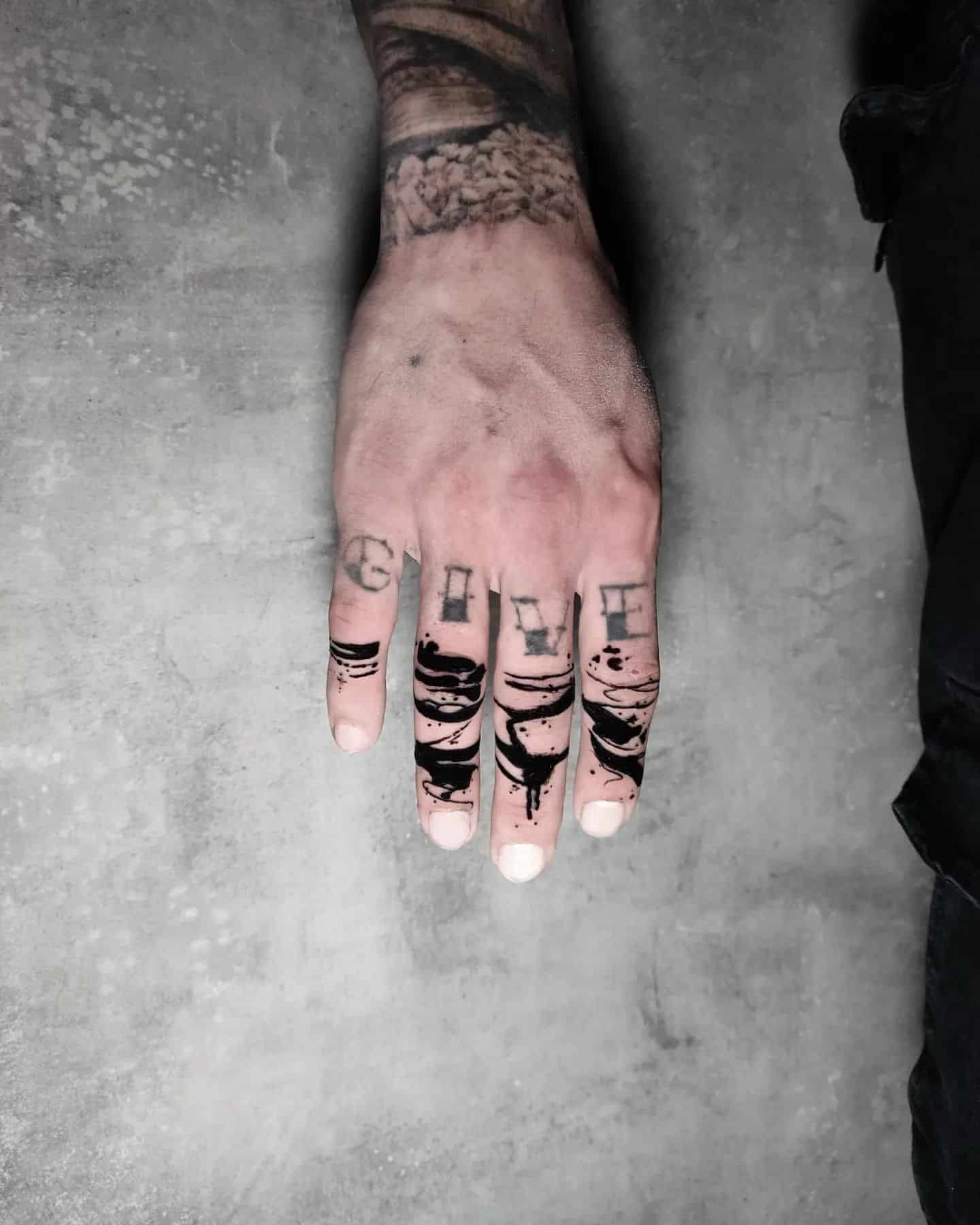 thumb tattoos for men 0019