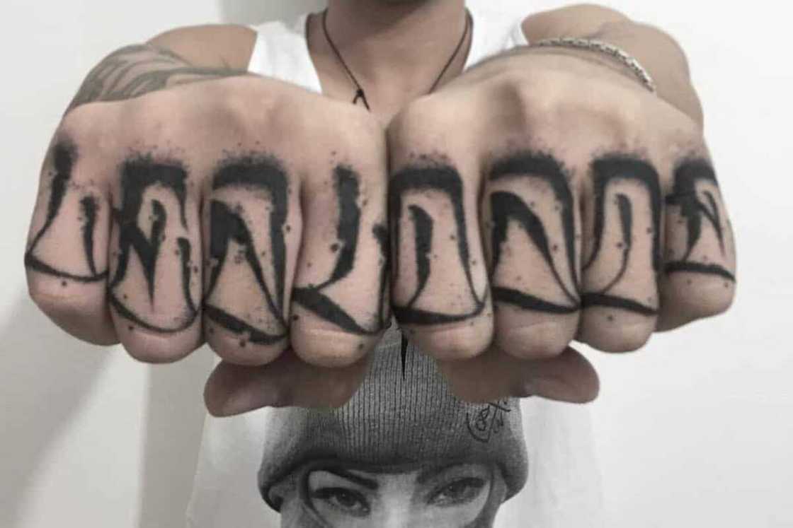 thumb tattoos for men 0058