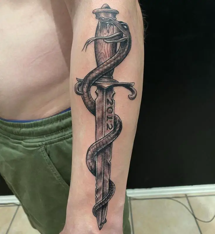 traditional dagger tattoos for men