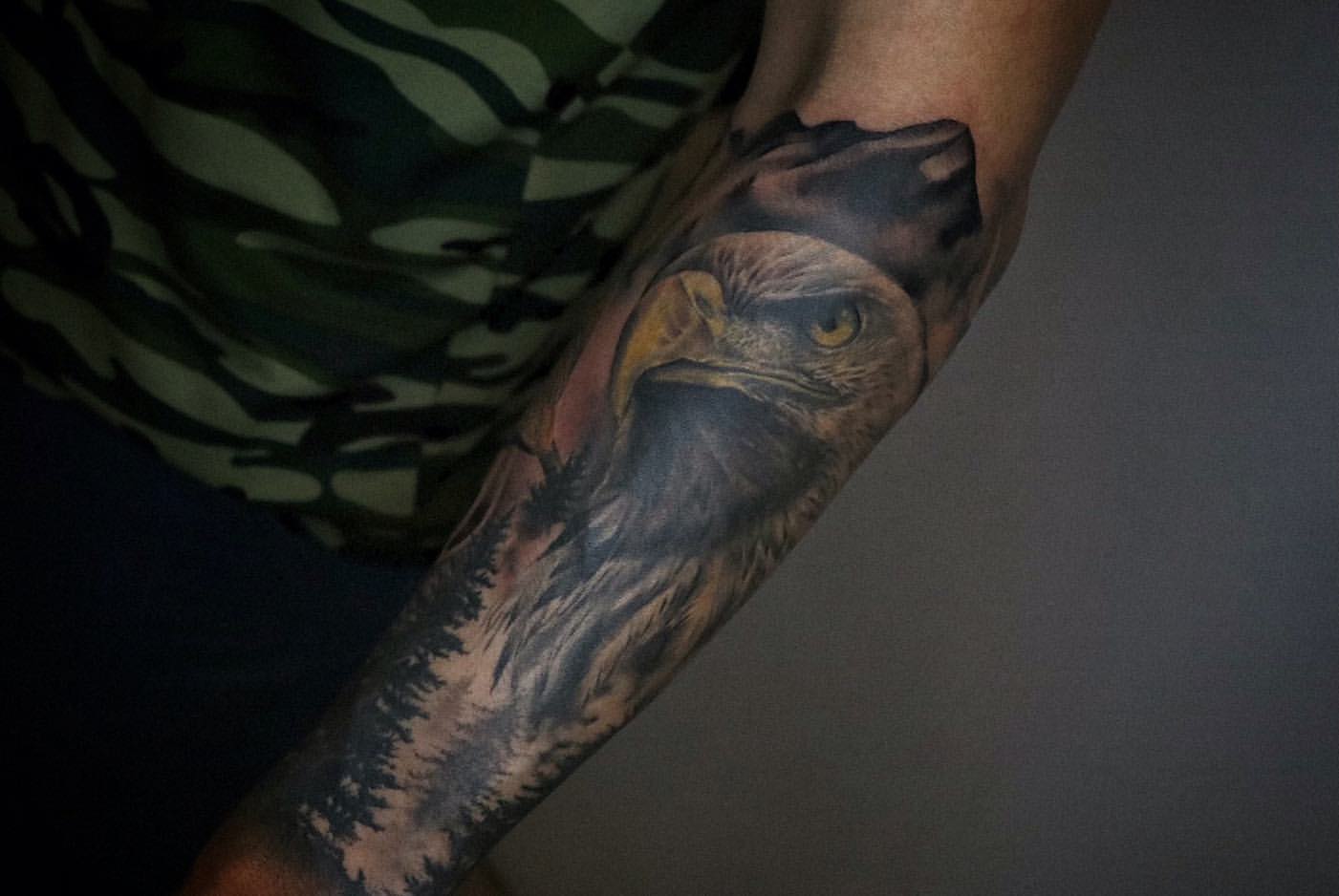 traditional eagle forearm tattoos for men