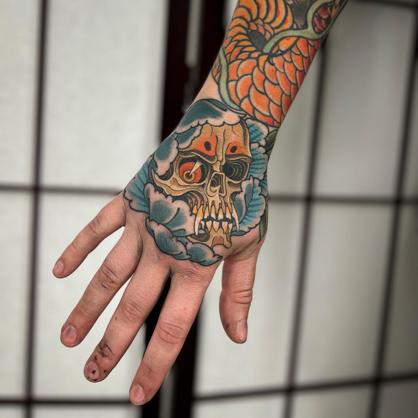 traditional hand tattoos for men symbols