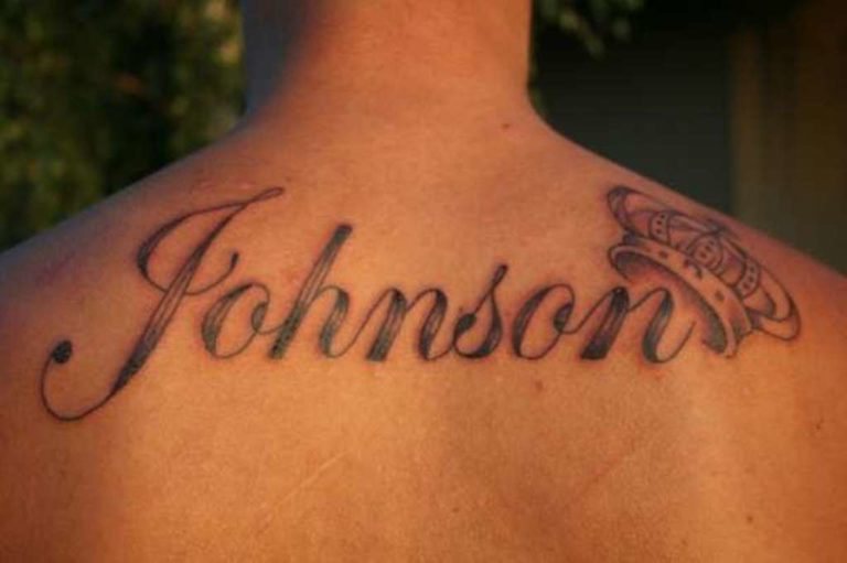 traditional last name back tattoos for men